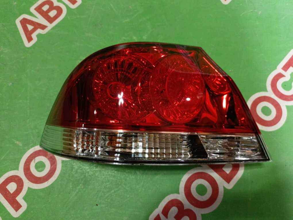 Фонарь задний левый Mitsubishi Lancer 2003-2007 9 214-1983L-AE новая
