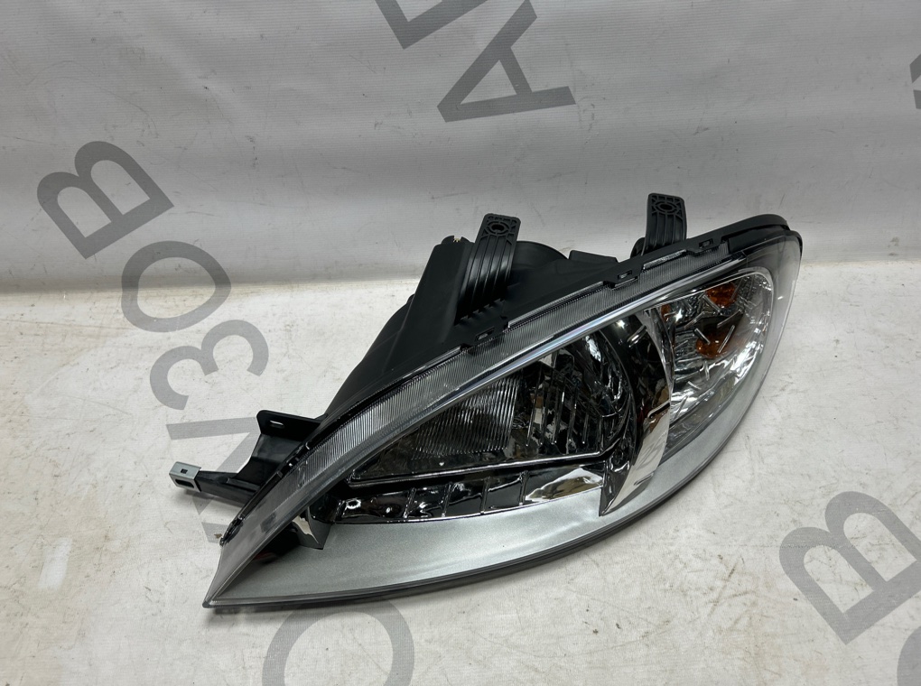 Фара левая Lacetti 2004-2013 T255 Фара левая Lacetti 2004-2013 T255