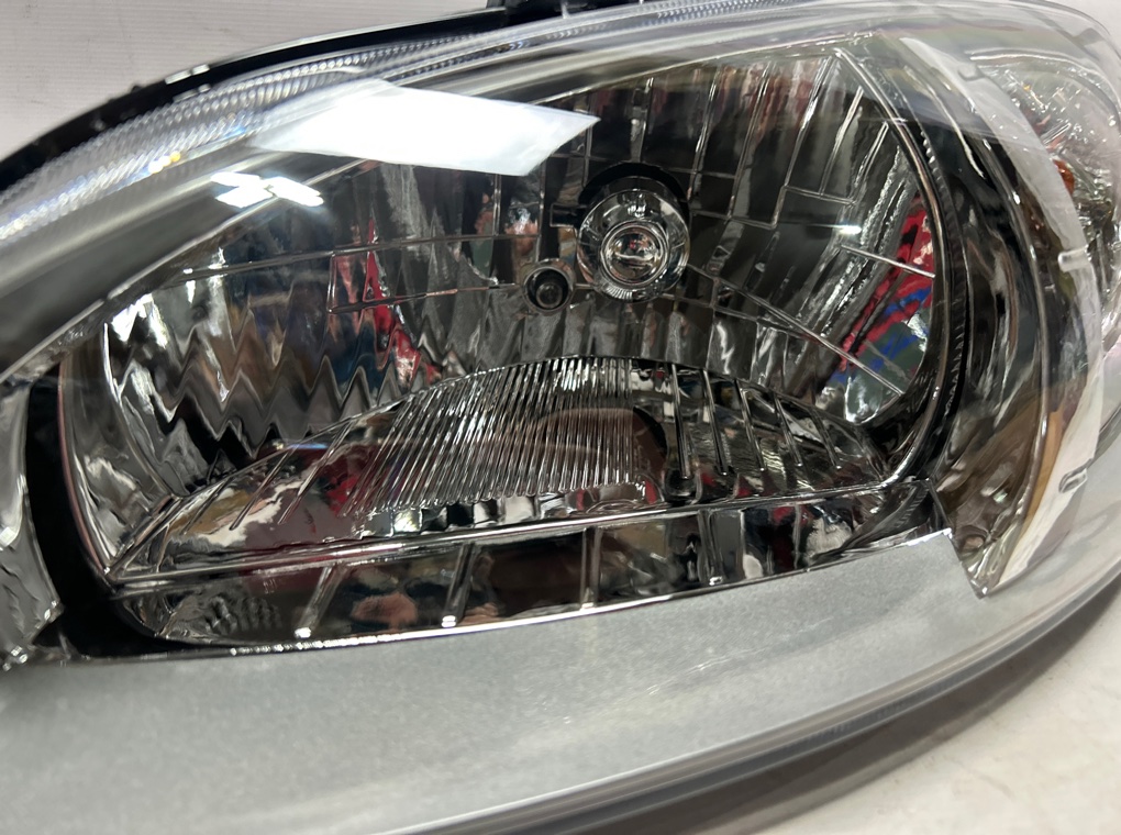 Фара левая Lacetti 2004-2013 T255 Фара левая Lacetti 2004-2013 T255