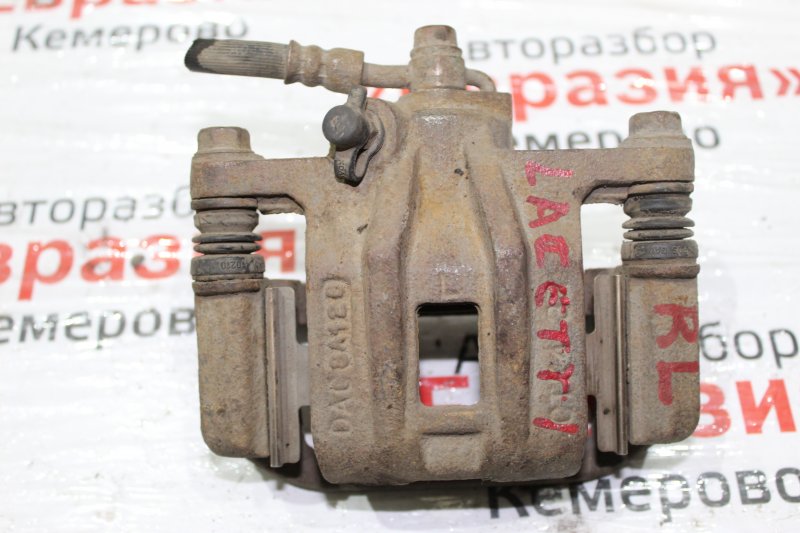 Суппорт задний aveo t250. Суппорт торм шевроле лачетти задний. Задний тормозной суппорт дэу гентра. Суппорт тормозной шевроле. Тормозной суппорт нива 2121.