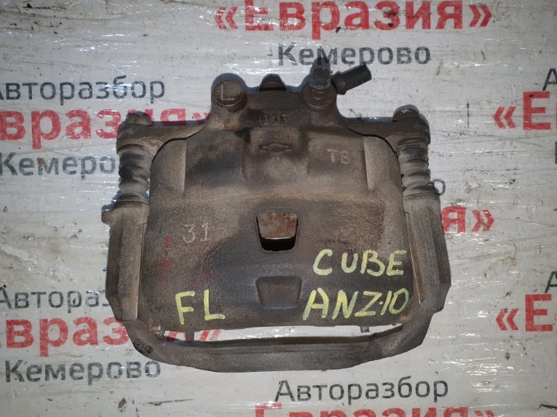 Суппорт тормозной Nissan Cube ANZ10 CGA3DE 2000 передний левый