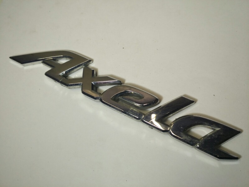 Эмблема багажника Mazda Axela BK3P