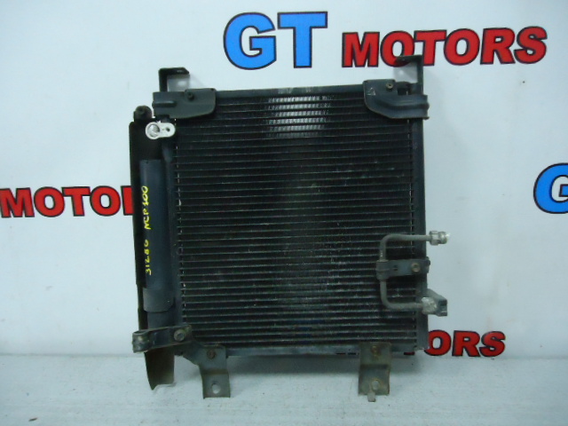 Радиатор кондиционера Toyota Duet M`100A EJ-DE