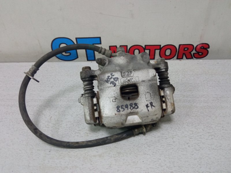 Суппорт Toyota Passo KGC30 1KR-FE передний правый