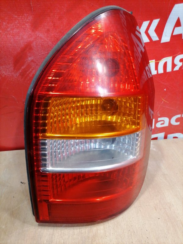 Стоп-сигнал Subaru Traviq XM220 Z22SE 2003 задний правый Желтый поворотник