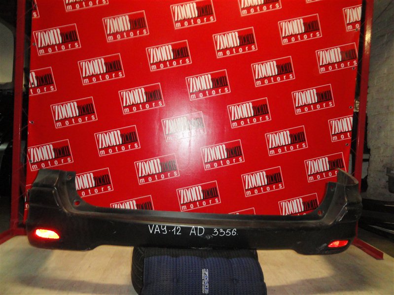 Бампер Nissan Ad VY12 HR15DE 2006 задний черный (б/у)