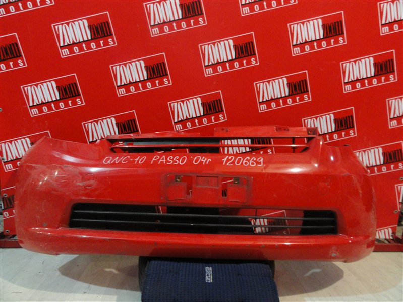 Бампер Toyota Passo QNC10 K3-VE 2004 передний красный (б/у)