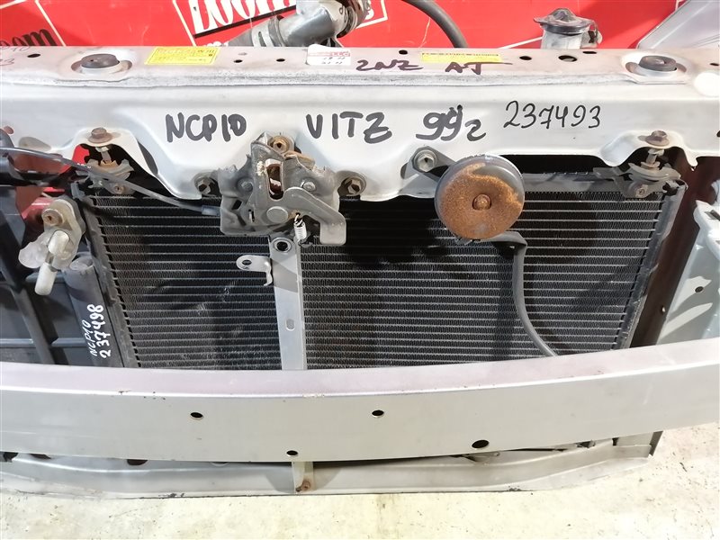 Радиатор кондиционера Toyota Vitz NCP10 1NZ-FE 1999 передний (б/у)