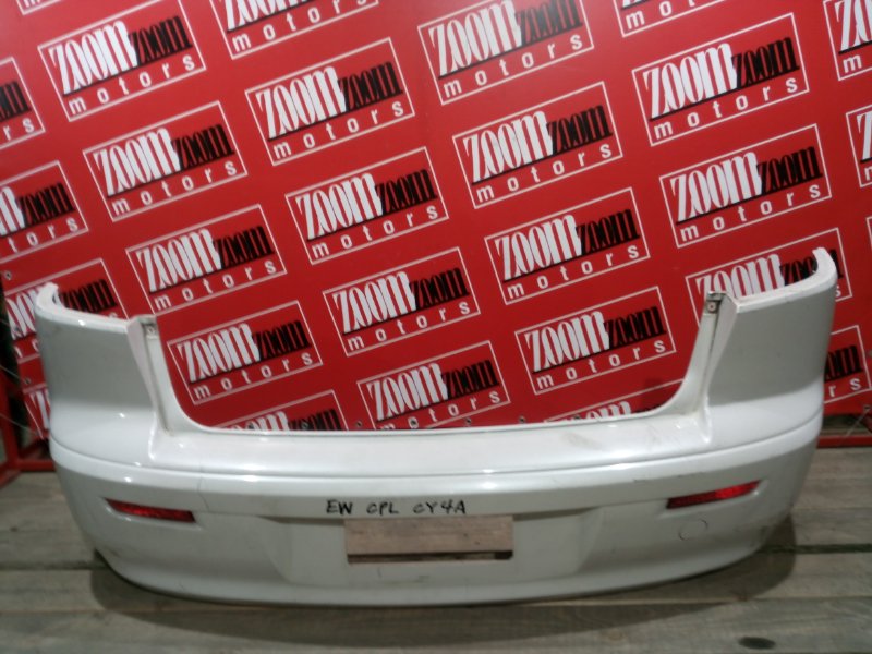 Бампер Mitsubishi Lancer X CY4A 4B11 2006 задний белый перламутр (б/у)