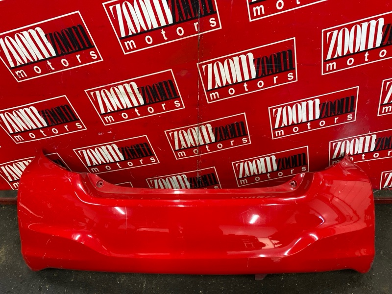Бампер Toyota Vitz KSP130 1KR-FE 2010 задний красный (б/у)