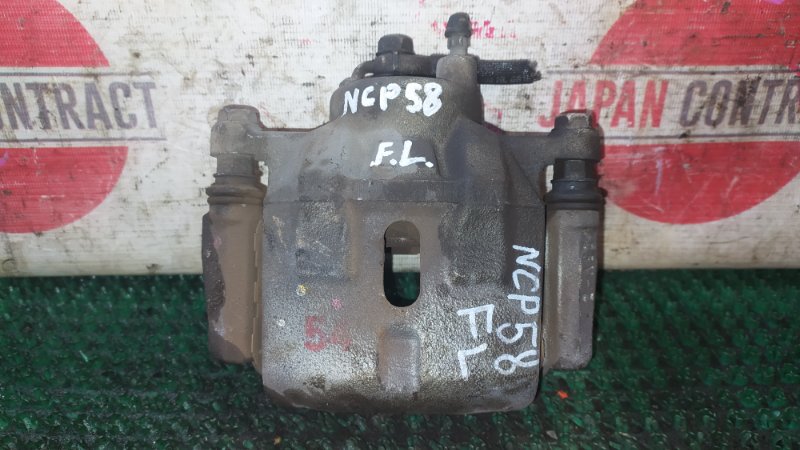 Суппорт Toyota Succeed NCP58G 1NZ-FE 2013 передний левый