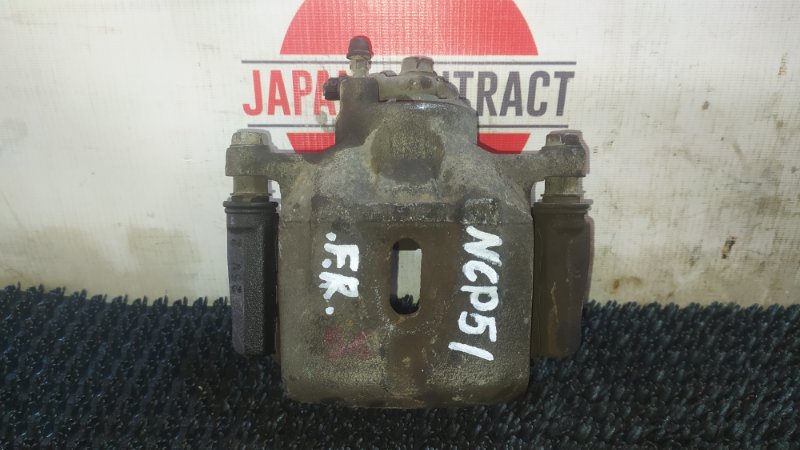 Суппорт Toyota Probox NCP51V 1NZ-FE 2008 передний правый