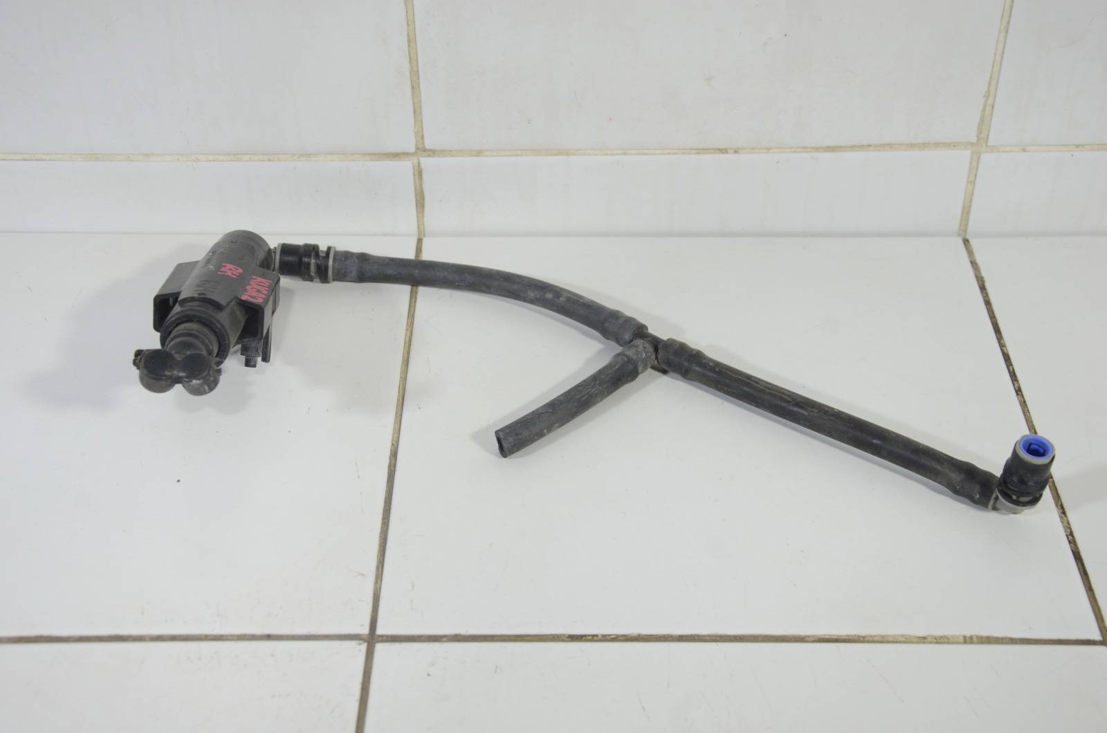 Форсунка омывателя фар CV6113L014AB
