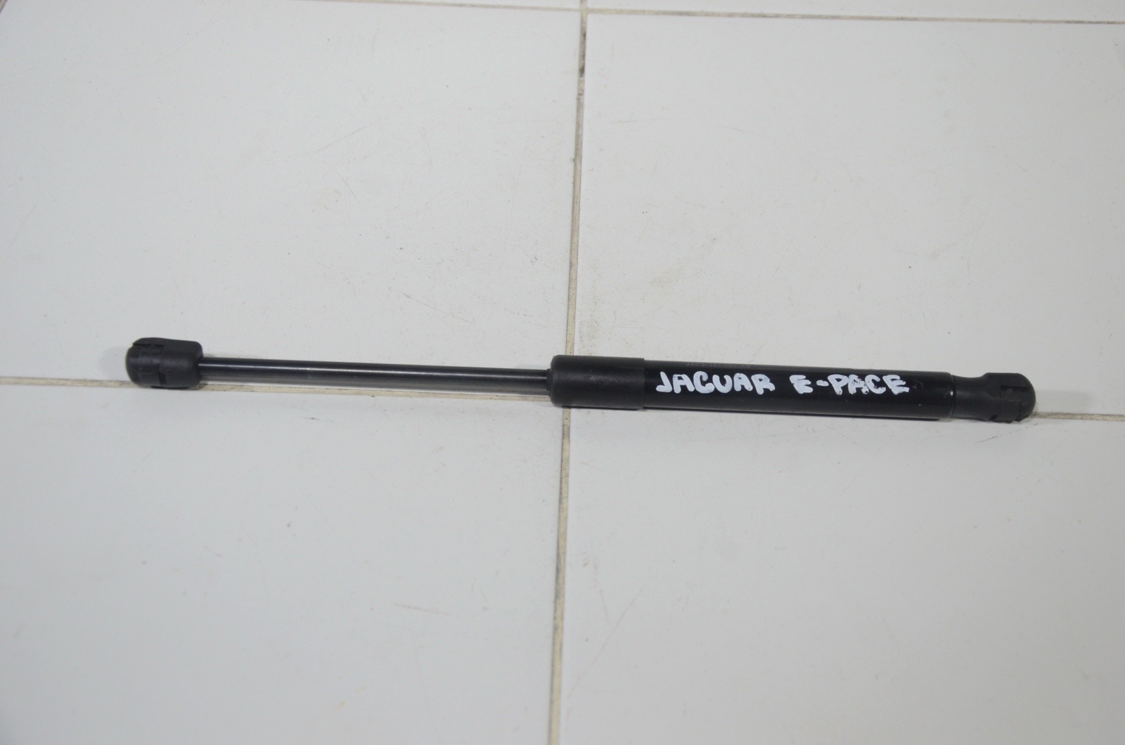 амортизатор капота J9C2903