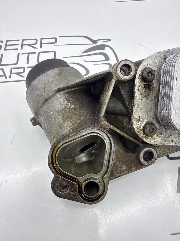 Корпус масляного фильтра Chevrolet Aveo Т250/255 F14D4