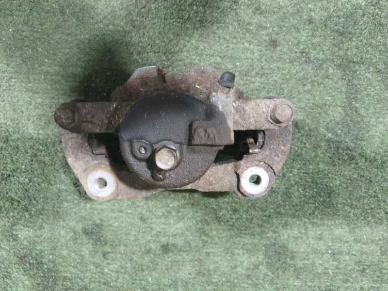 Суппорт передний правый передний правый COROLLA AXIO 2007 NZE141 1NZ-FE