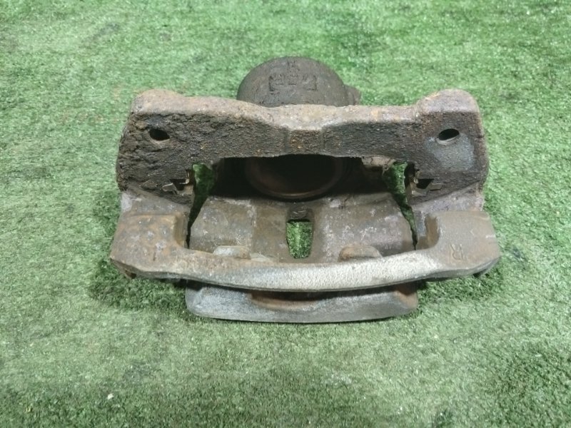 Суппорт передний правый передний правый TOYOTA COROLLA AXIO NZE141 1NZ-FE