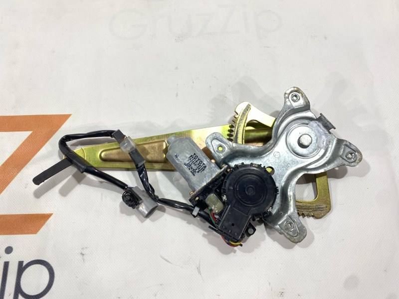Мотор стеклоподъемника Toyota Land Cruiser Cygnus UZJ100W 2UZ-FE 2000 задний левый (б/у) Мотор стеклоподъемника Toyota Land Cruiser Cygnus UZJ100W 2UZ-FE 2000 задний левый (б/у)