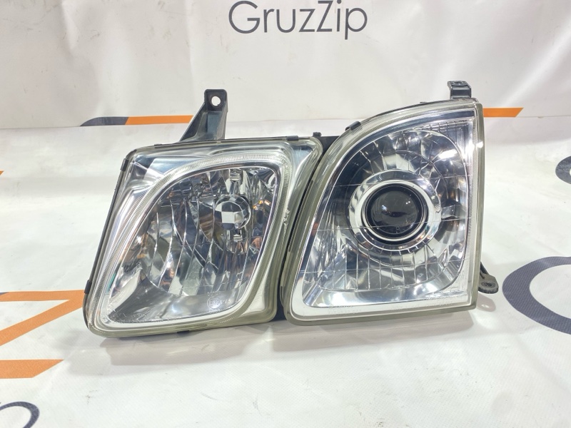 Фара Toyota Land Cruiser Cygnus UZJ100W 2UZ-FE 2000 передняя левая (б/у) Фара Toyota Land Cruiser Cygnus UZJ100W 2UZ-FE 2000 передняя левая (б/у)