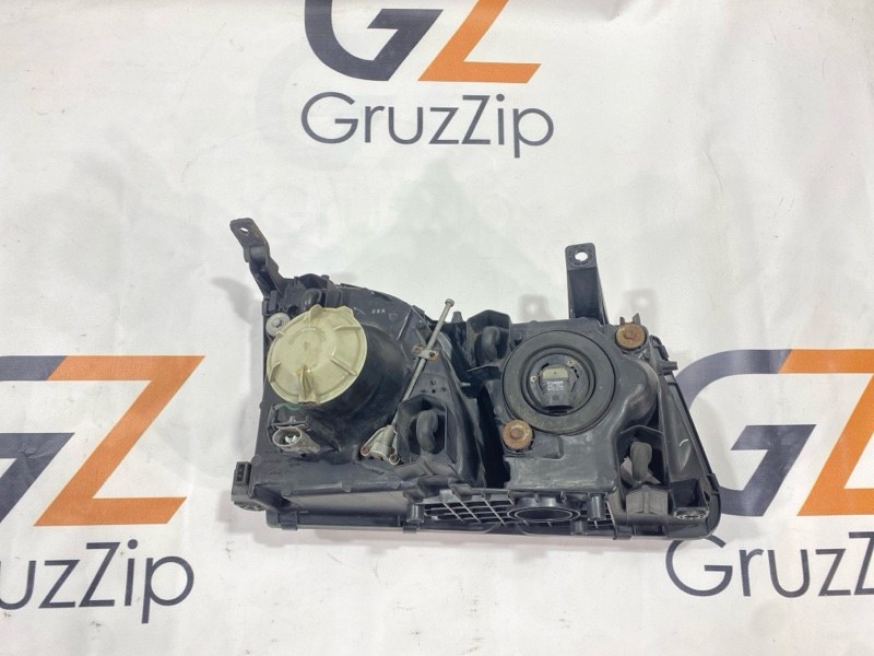 Фара Toyota Land Cruiser Cygnus UZJ100W 2UZ-FE 2000 передняя левая (б/у) Фара Toyota Land Cruiser Cygnus UZJ100W 2UZ-FE 2000 передняя левая (б/у)