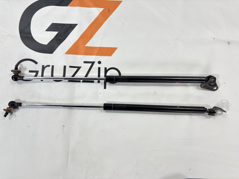 Амортизатор двери багажника Toyota Land Cruiser Cygnus UZJ100W 2UZ-FE 1999 (б/у)