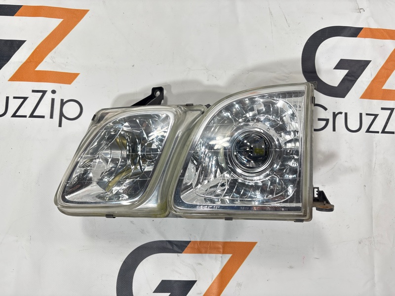 Фара Toyota Land Cruiser Cygnus UZJ100W 2UZ-FE 1999 левая (б/у)
