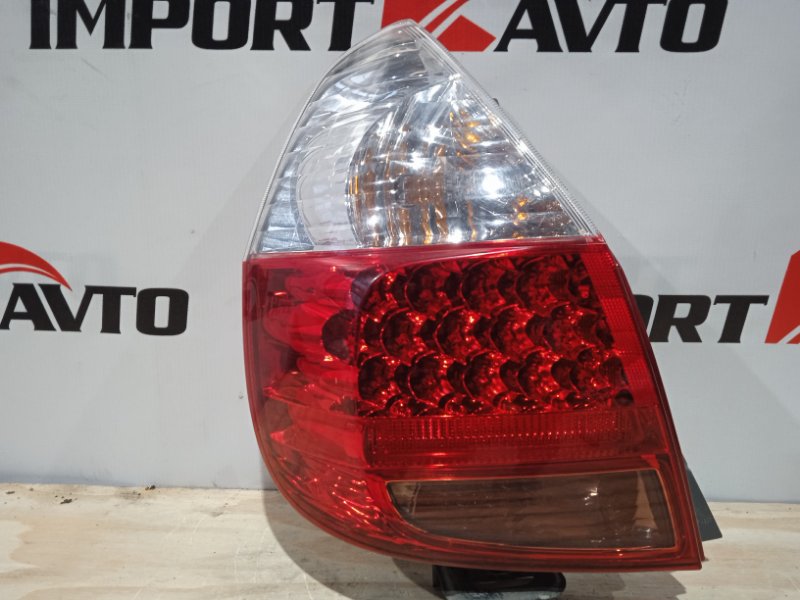 стоп-сигнал HONDA FIT GD1 L13A 2005-2007 левый 472302
