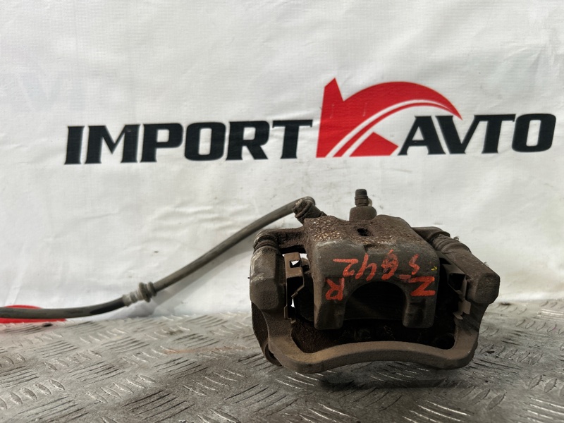 Суппорт тормозной NISSAN TINO V10 QG18DE 1998-2003 задний правый 520363