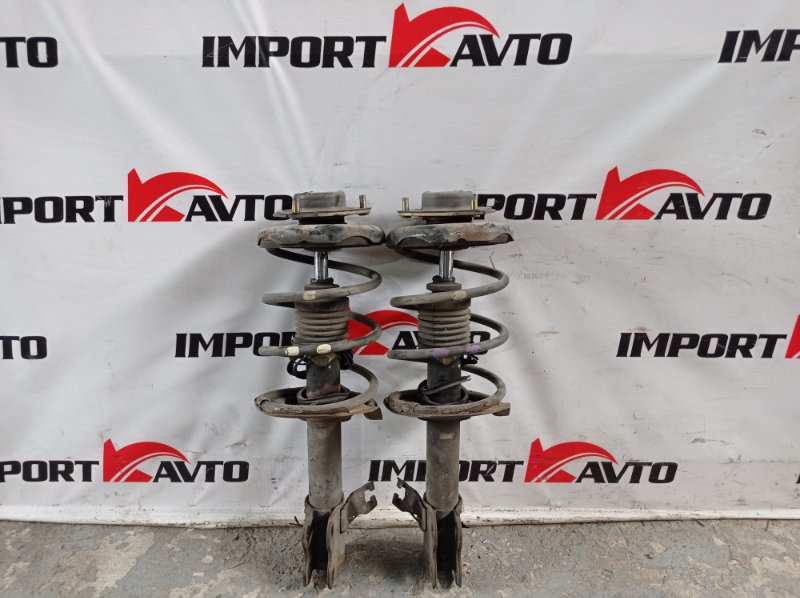 Стойка NISSAN TINO V10 QG18DE 1998-2003 передний 523463