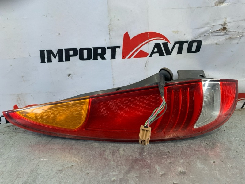 Стоп-сигнал NISSAN TINO V10 QG18DE 1998-2003 левый 525490