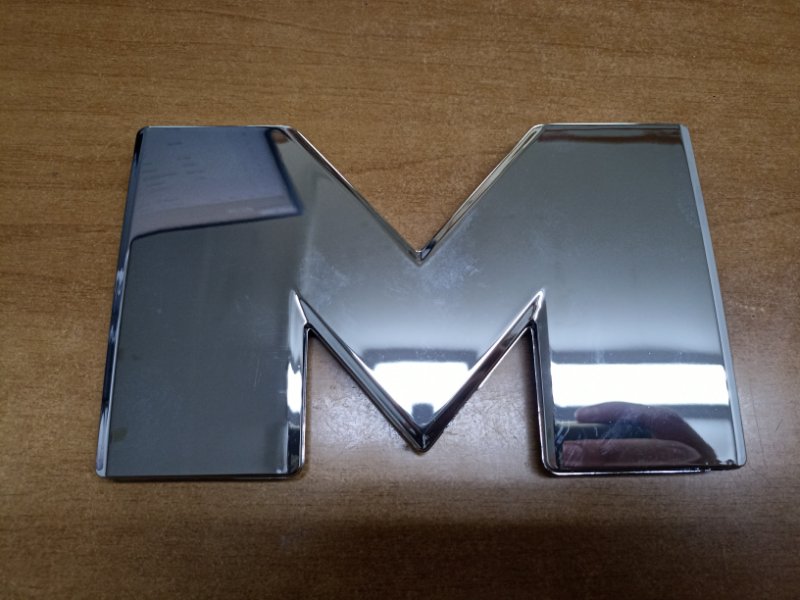 Эмблема буква "m" Man Tgs