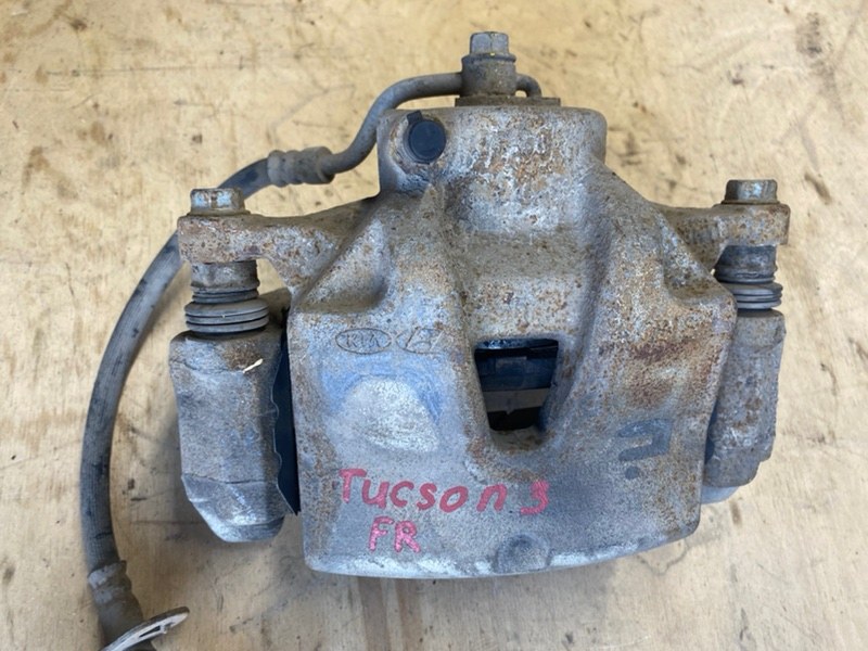 Суппорт тормозной передний правый Tucson 2019 TL 2.0 D4HA