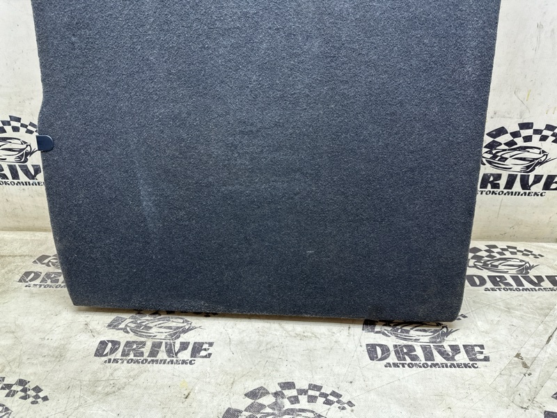 Обшивка багажника задняя Demio DY3R