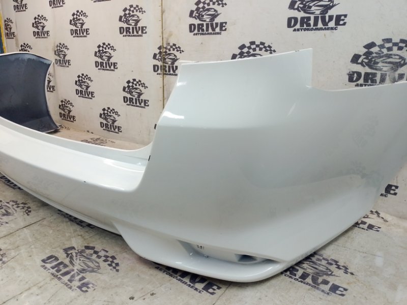 Бампер задний toyota Corolla Fielder NZE161