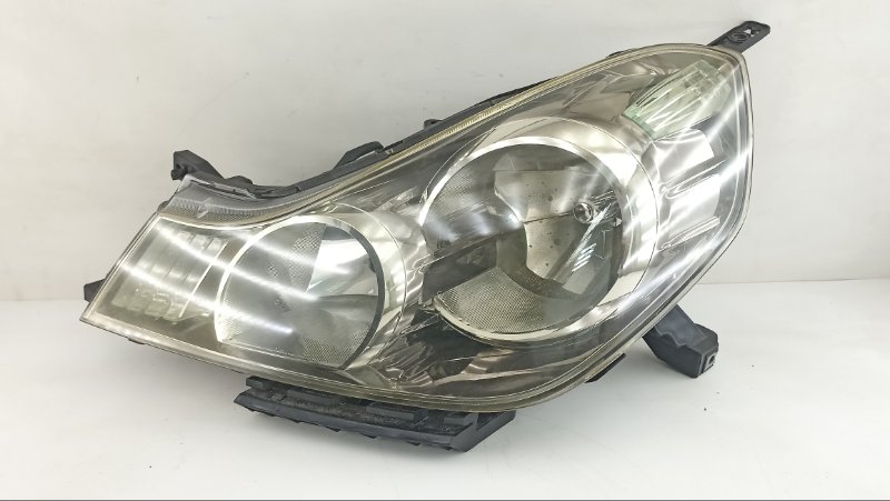 Фара Nissan Wingroad Y12 2010 левая