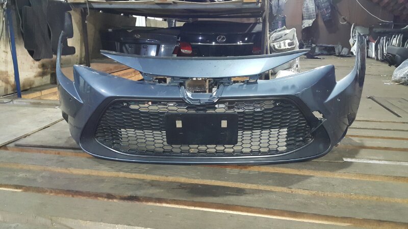 Бампер Toyota Corolla ZWE214 передний