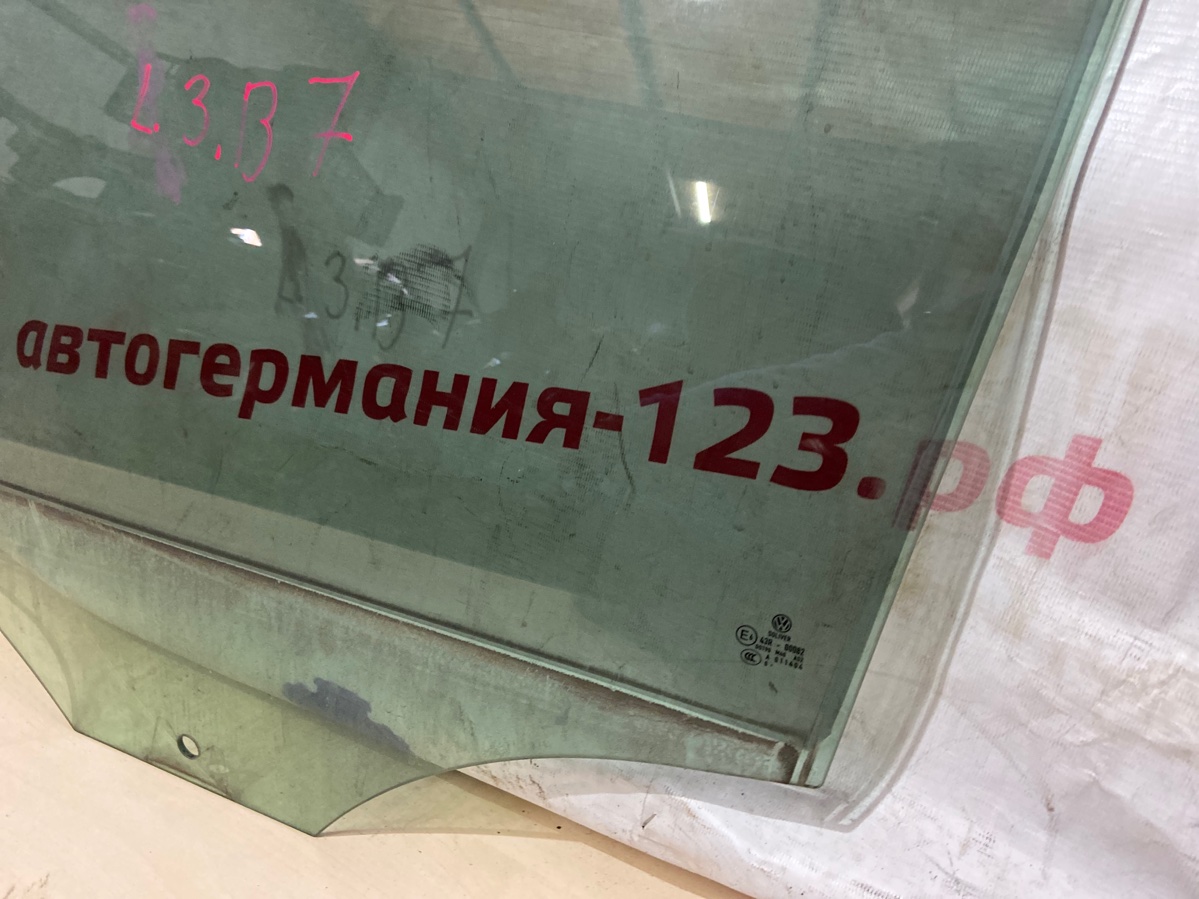 Стекло двери заднее левое Passat 2013 B7