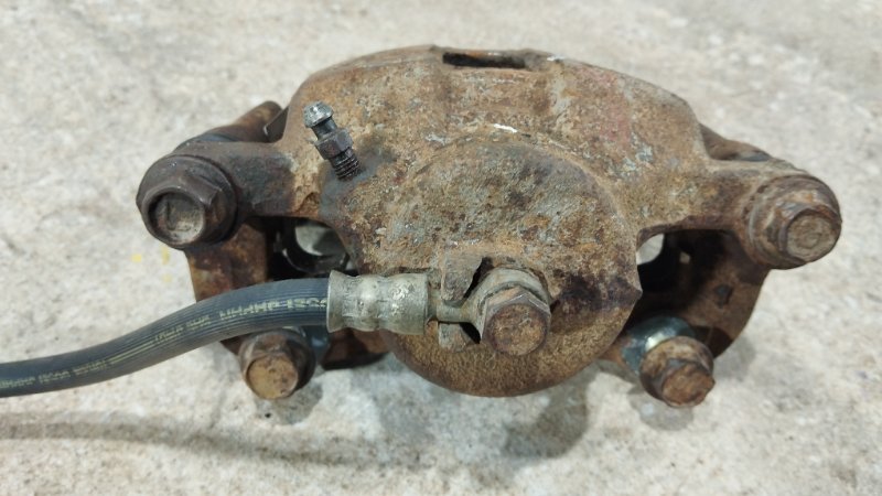 Суппорт тормозной передний левый Mirage 2001 CK5A 4G93