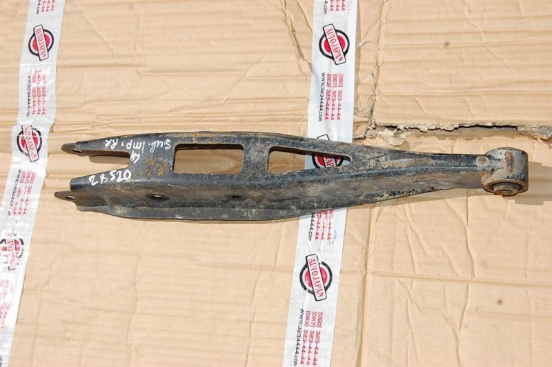 Рычаг задней подвески поперечный нижний