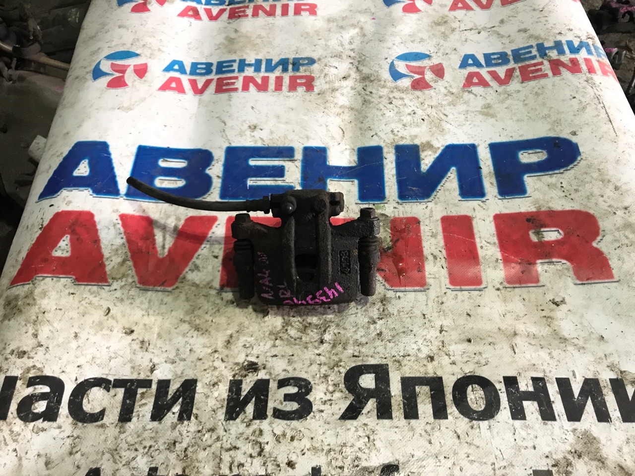 Суппорт Mitsubishi Grandis NA4W задний левый
