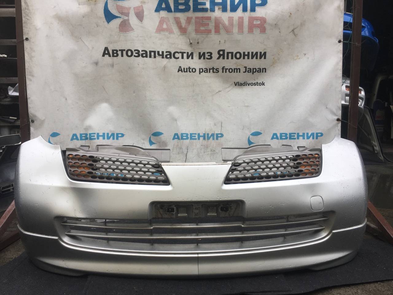 Бампер Nissan March K12 передний