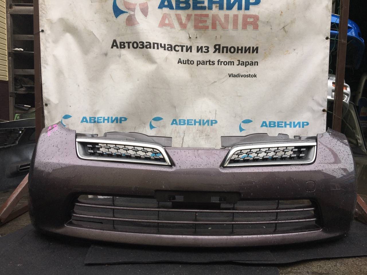 Бампер Nissan March K12 передний