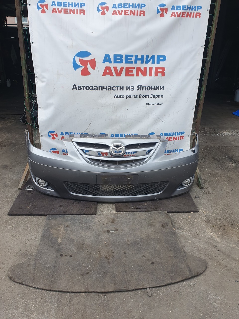 Бампер Mazda Mpv LW3W передний