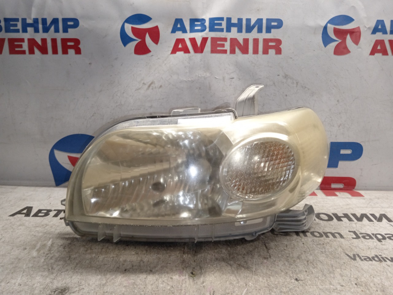 Фара Toyota Porte NNP10 передняя левая