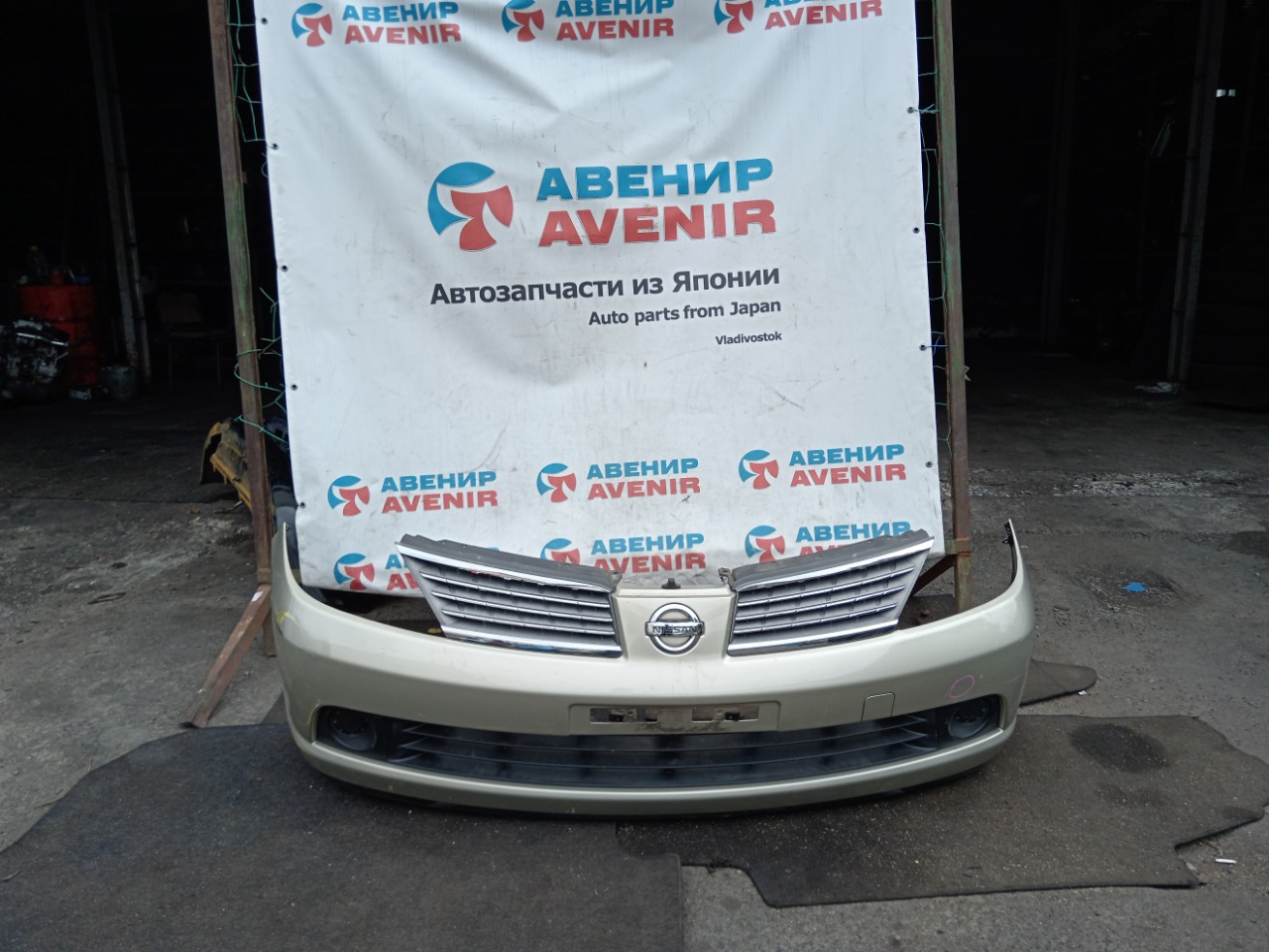 Бампер NISSAN TIIDA C11 передний (б/у)
