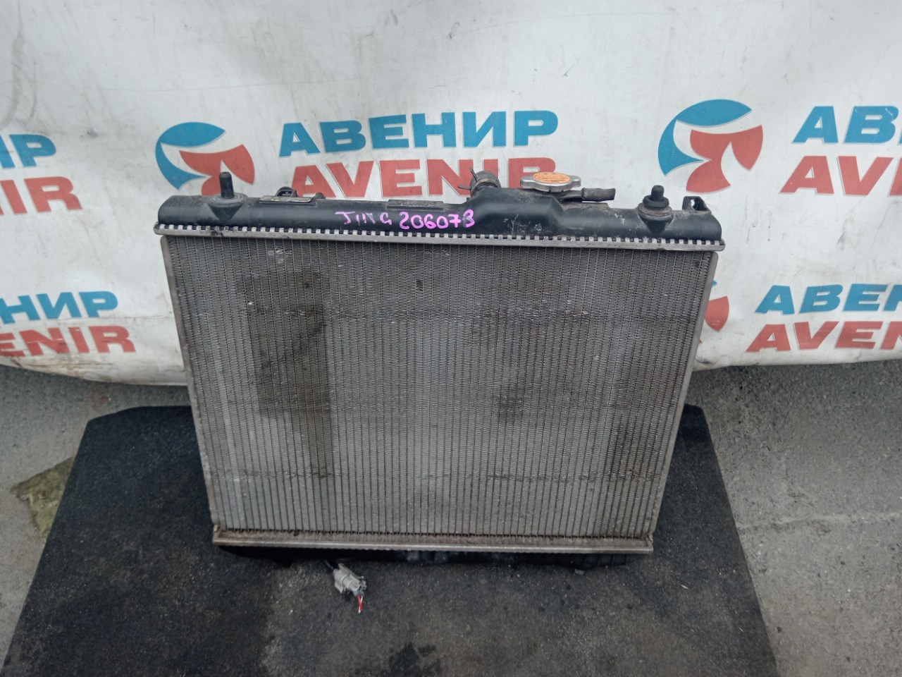 Радиатор DAIHATSU TERIOS KID J111G EF (б/у)