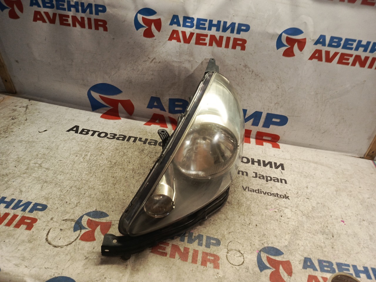 Фара HONDA FIT GD1 левая (б/у)