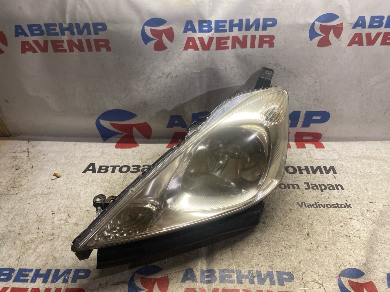 Фара HONDA FIT SHUTTLE GP2 передняя левая (б/у)