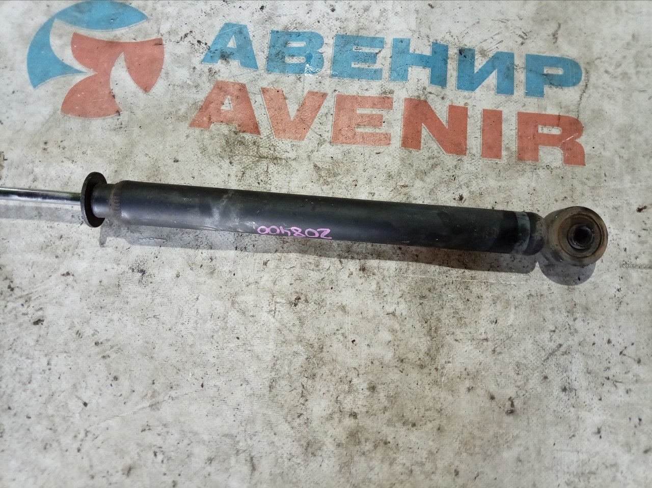 Амортизатор DAIHATSU MOVE LA100S задний левый (б/у)