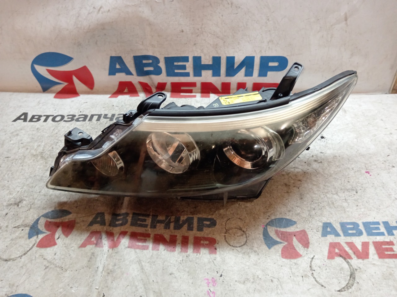 Фара TOYOTA ESTIMA ACR55 передняя левая (б/у)